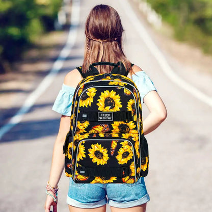 Kvinna bär solrosmönstrad ryggsäck med datorfack, bekväm för skola och resor