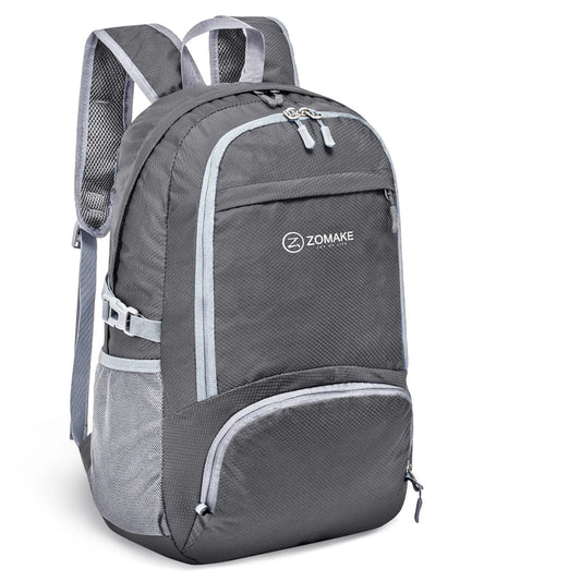 Hopvikbar Reseryggsäck i mörkgrå färg med lättviktsdesign och flera fack. Perfekt för resor och vardagsbruk.